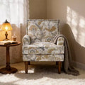 Fauteuil d'appoint contemporain en bois tapissé fleuri avec garniture cloutée